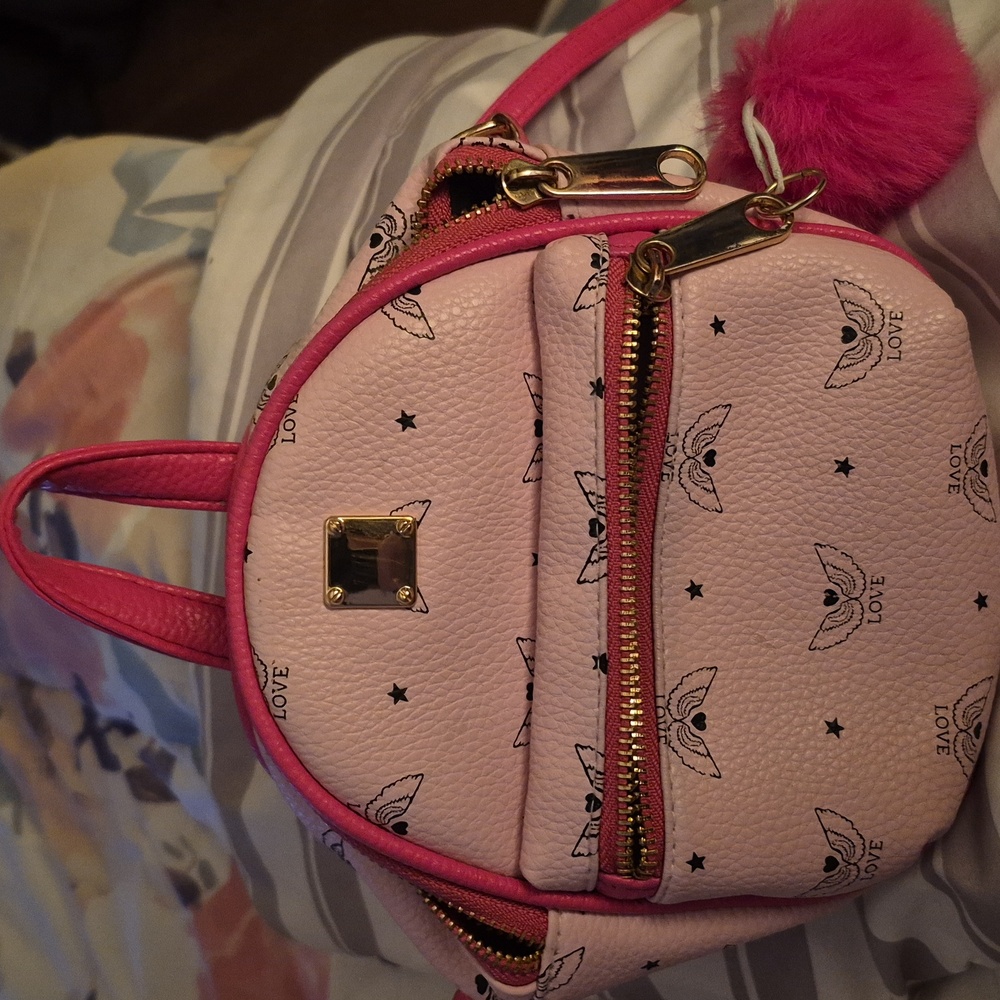 Pink Mini Backpack Looking Purse with Gold Accents